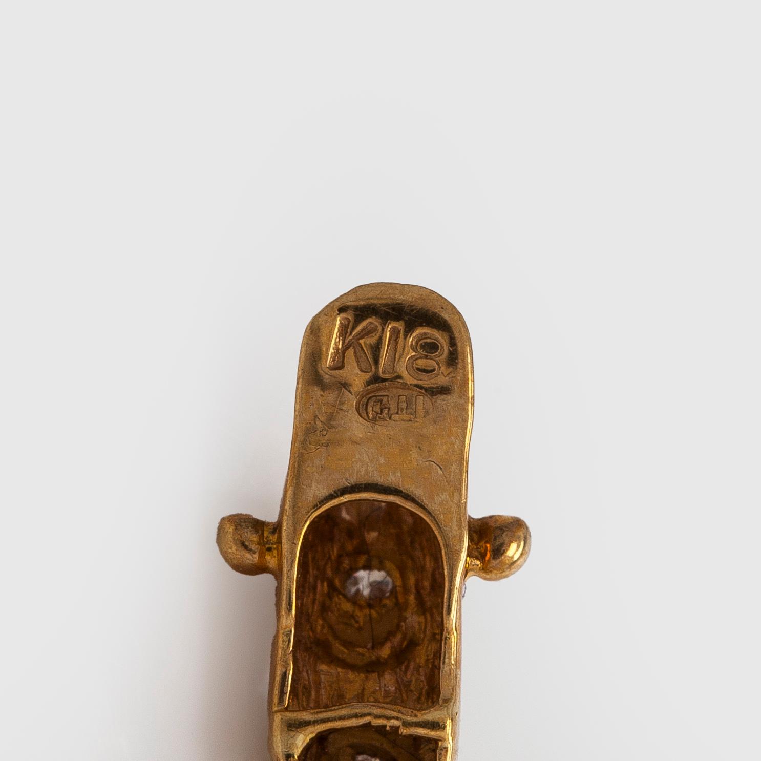 Armband, 18K guld och briljantslipade diamanter.