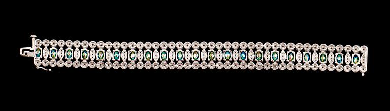 ARMBAND, sterlingsilver, vita och färgade topaser tot ca 25.00 ct.