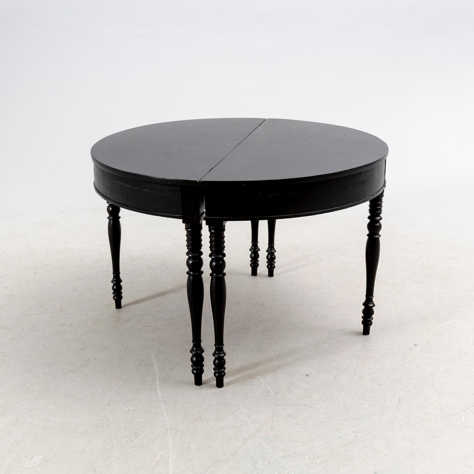A mid 18th century painted dining table.