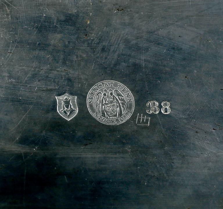 SKRIN, tenn och mässing. Firma Svenskt Tenn, Stockholm 1928.