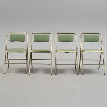 A table and four chairs by Dipetrol, second half of the 20th century.