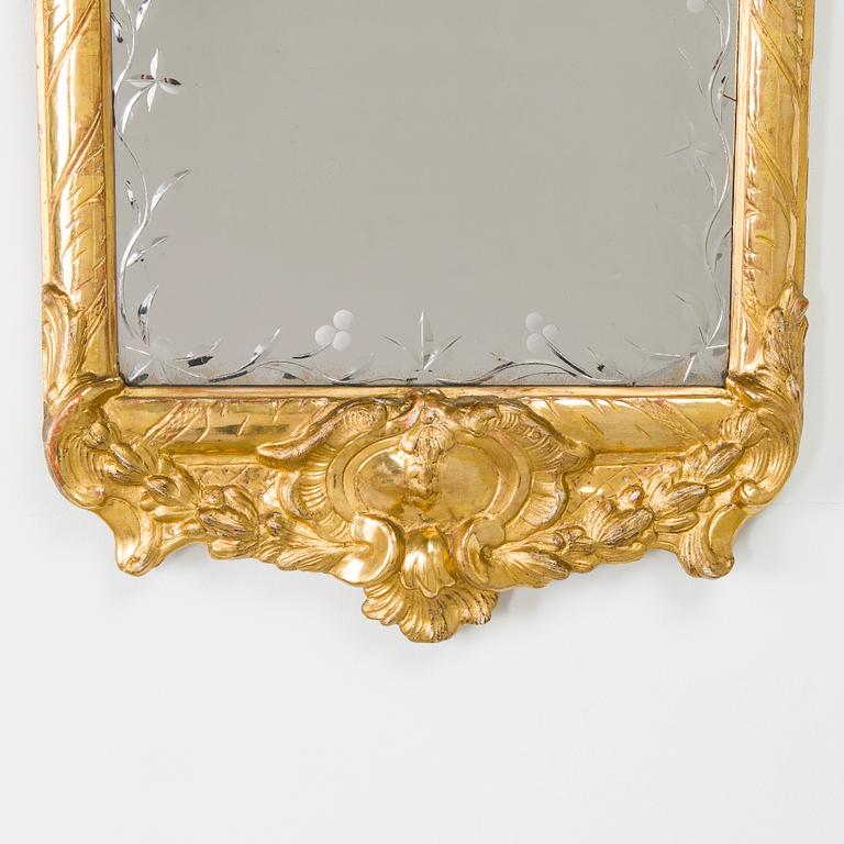 A Swedish rococo mirror, 18th century.