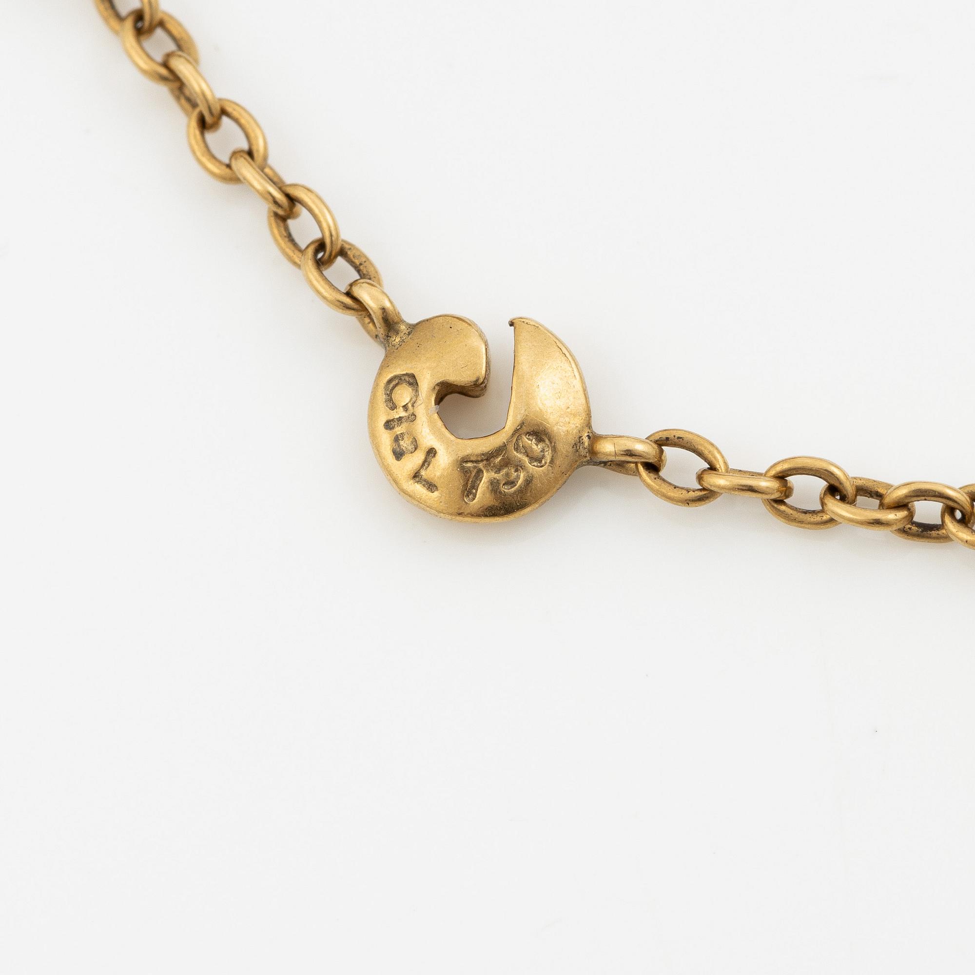 An Ole Lynggaard bracelet 18K gold with heart charm.