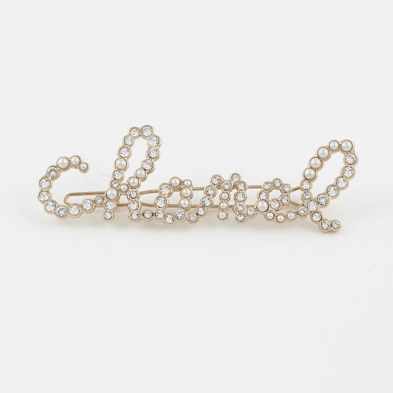 Chanel, a rhinestone hairpin, 2019.