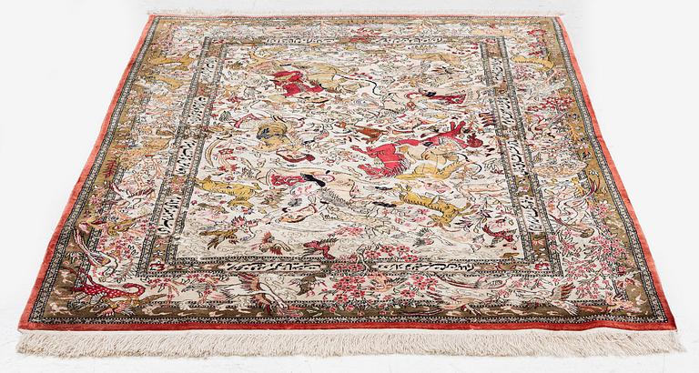 A silk Qum rug of 'hunting' design, c. 157 x 108 cm.