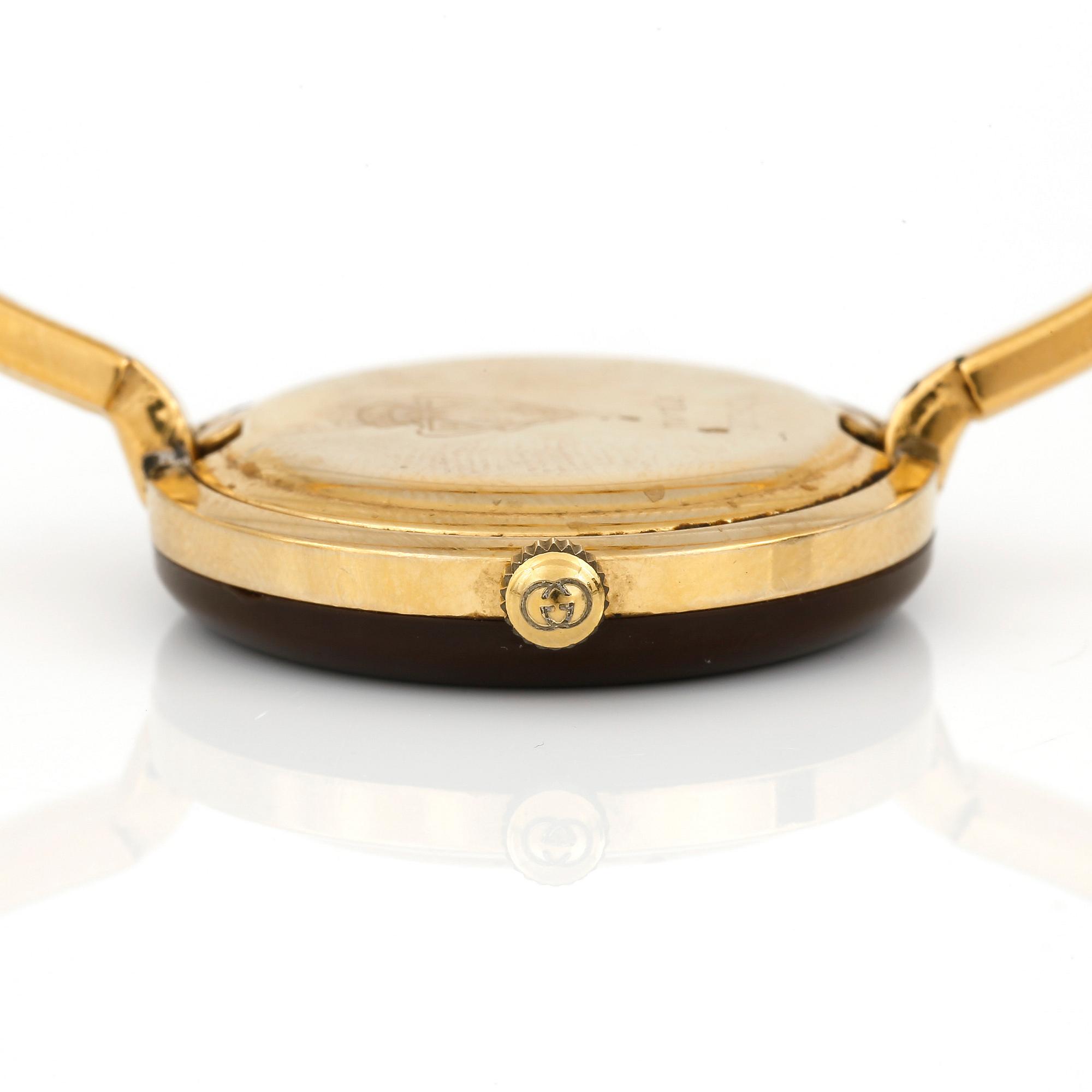 ARMBANDSUR, Gucci.