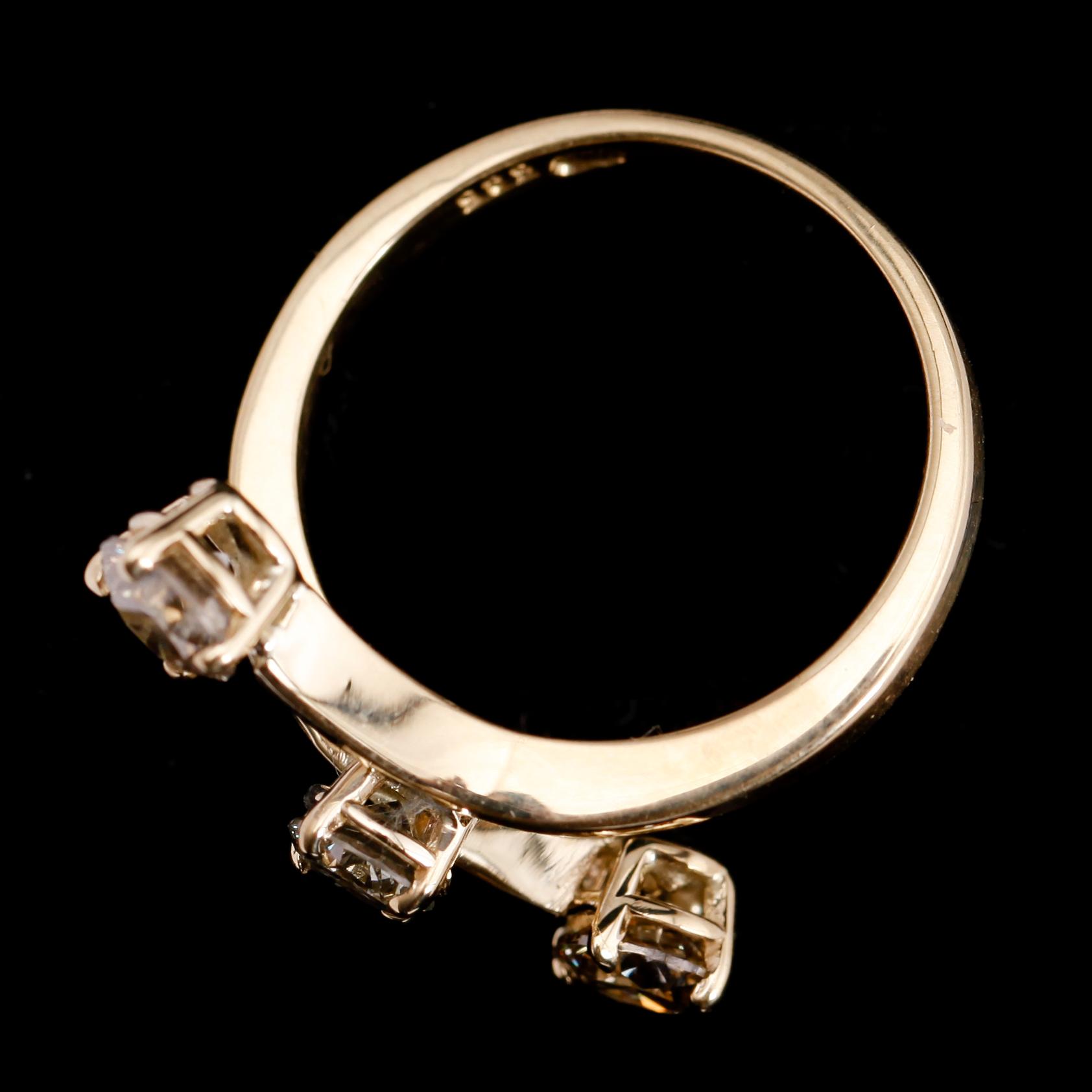 RING, 14 k guld, med 3 briljantslipade diamanter totalt 1.15 ct. Total vikt 4 g.