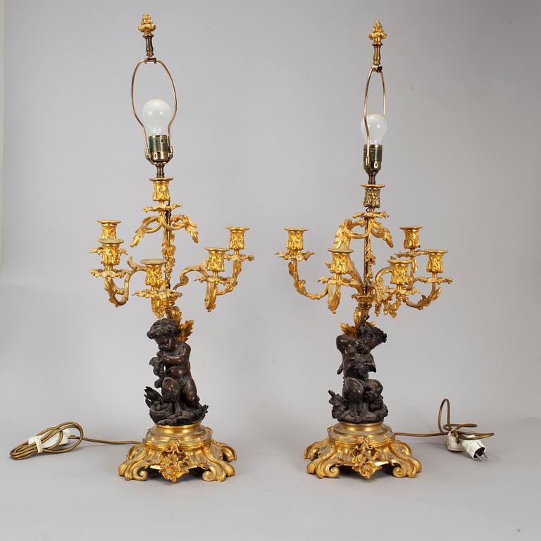 A pair of  mid 19th century, rococo-style TABLE LAMPS/CANDELABRA.
