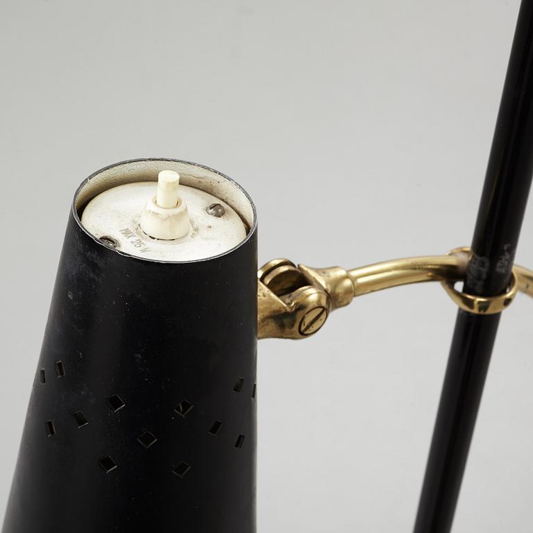 A Swedish Modern brass and black lacquered floor lamp, 1950's.