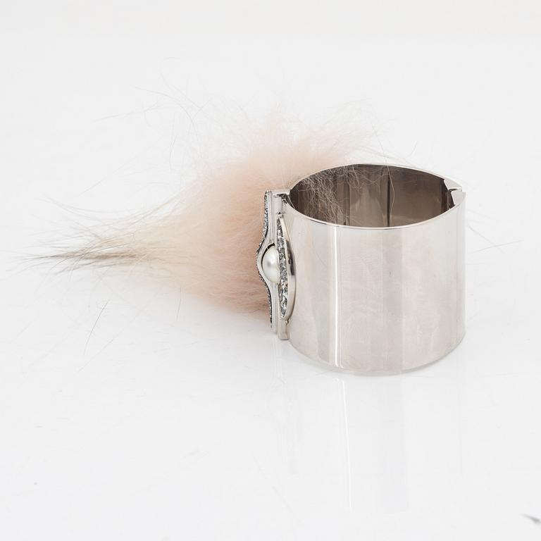 Fendi, a silvertone metal, rhinestone and fur bracelet.