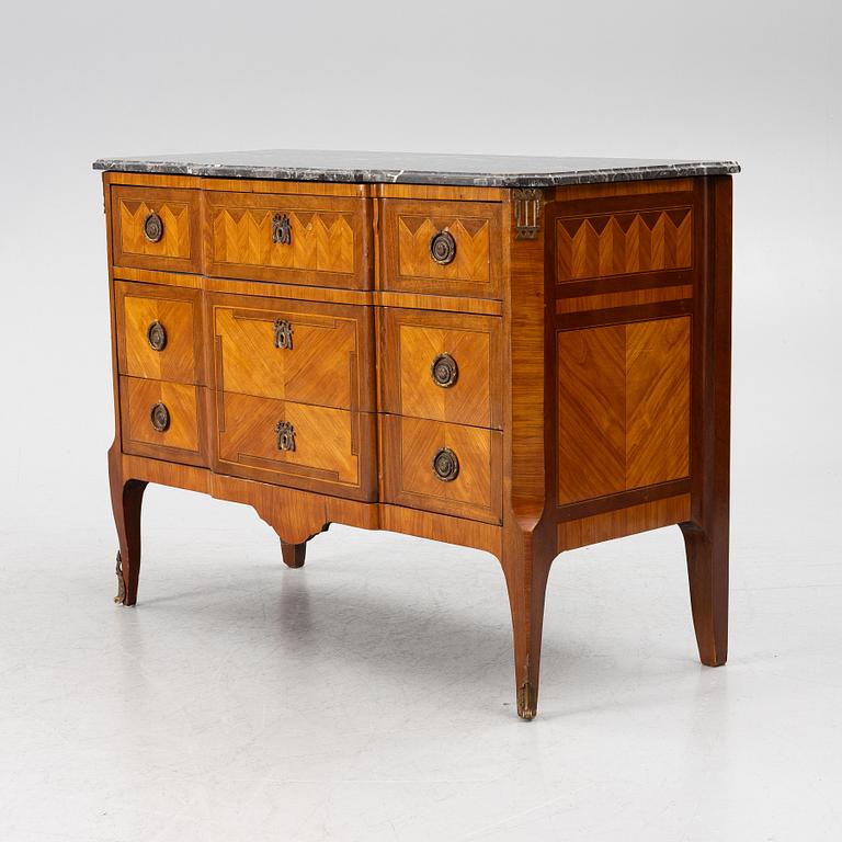 A Louis XVI style chest of drawers, France, circa 1900.