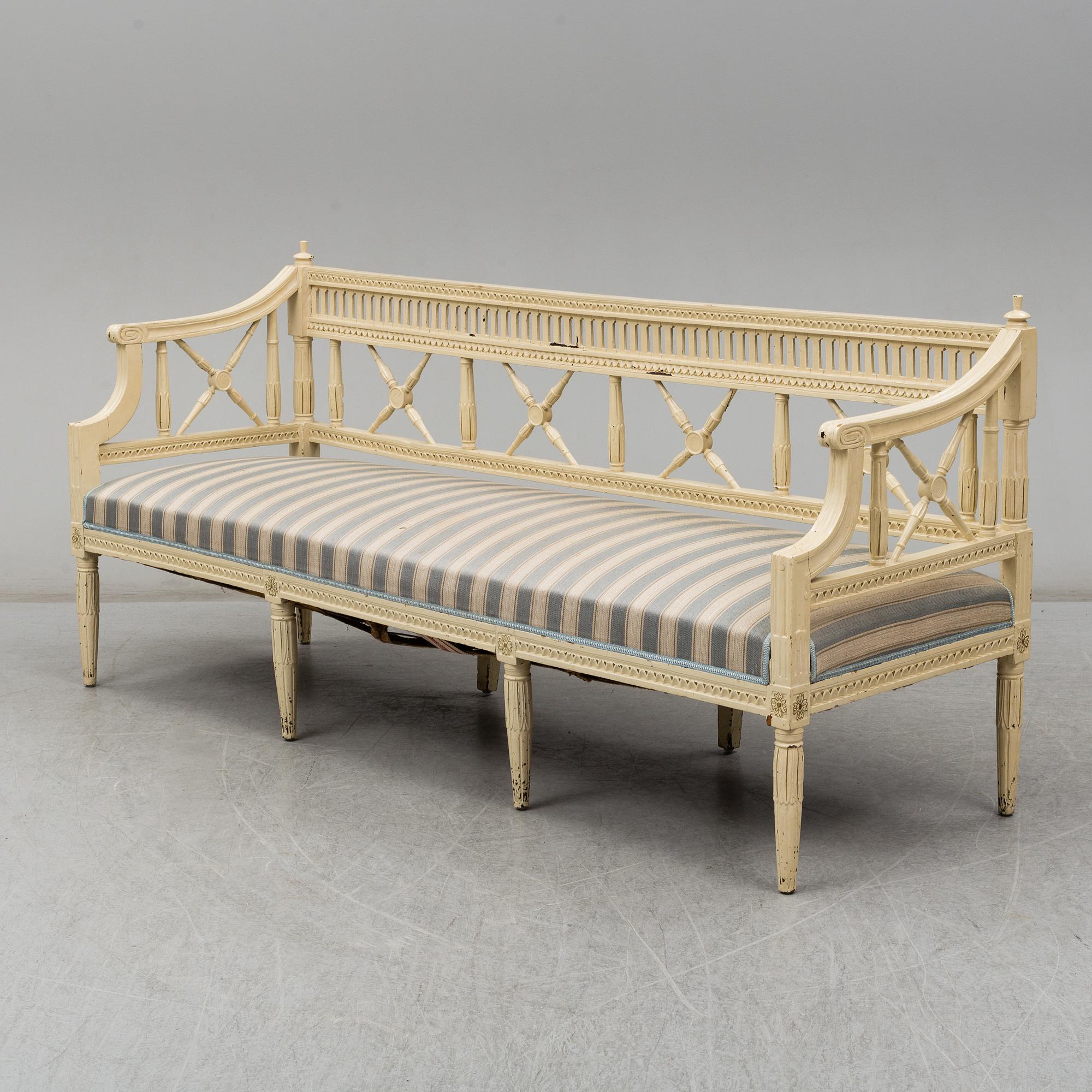 An early 19th century sofa and a pair of chairs.