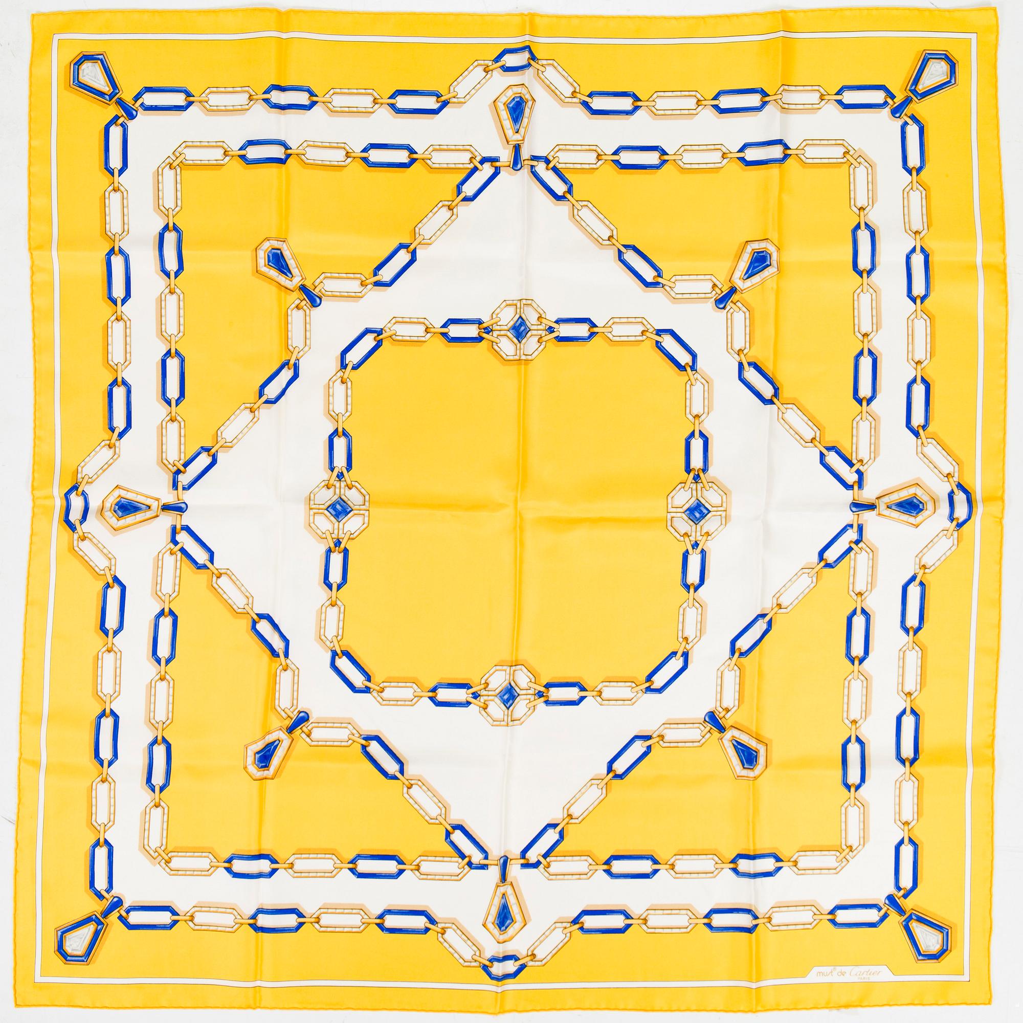 must de Cartier, a silk scarf.