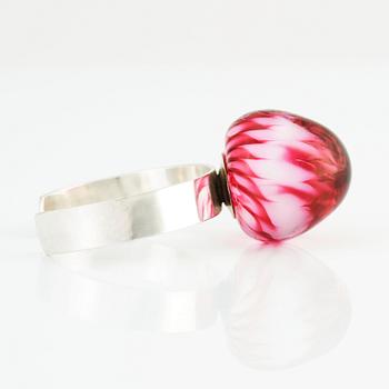 Sigurd Persson, a sterling silver bangle crowned with a strawberry coloured glass ball, Stockholm 1995.