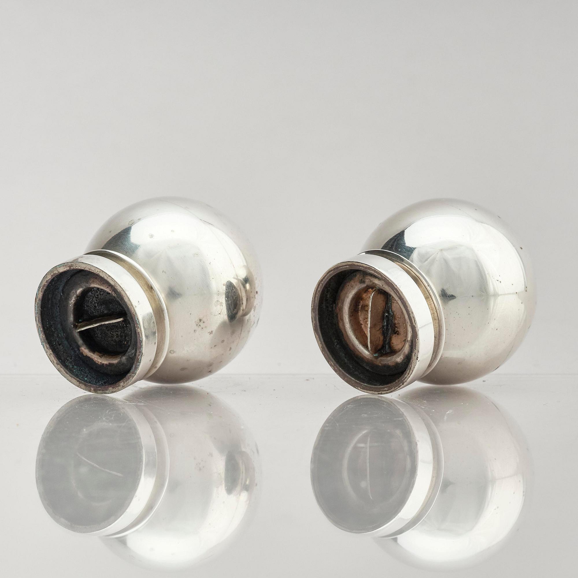 Georg Jensen, a pair of sterling silver salt shakers, model 'Pyramid/ Pyramide', design Harald Nielsen, no 632, Copenhagen after 1945.