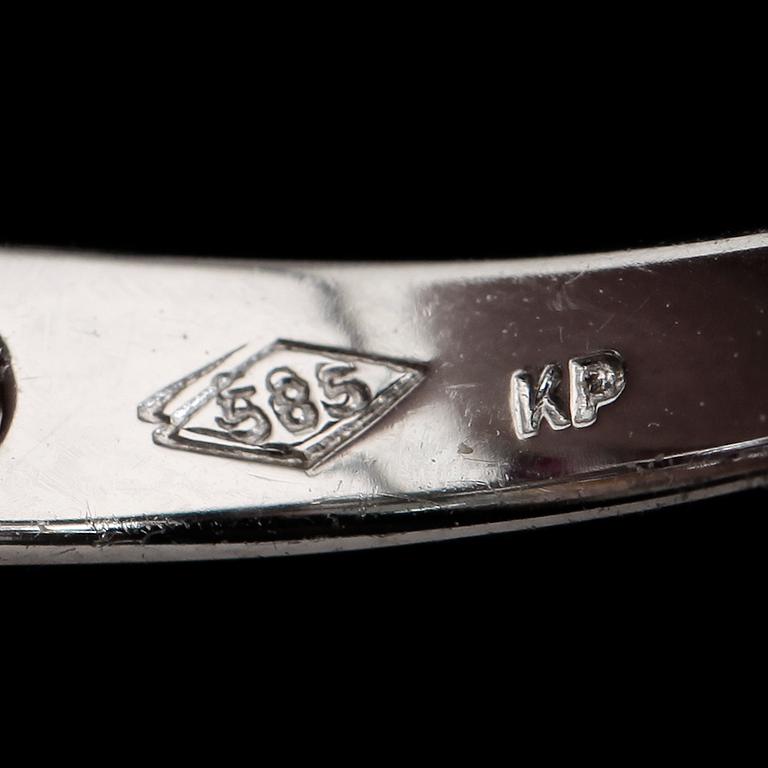RING, 14K vitguld, rubiner och briljantslipade diamanter. Vikt ca 3 g.