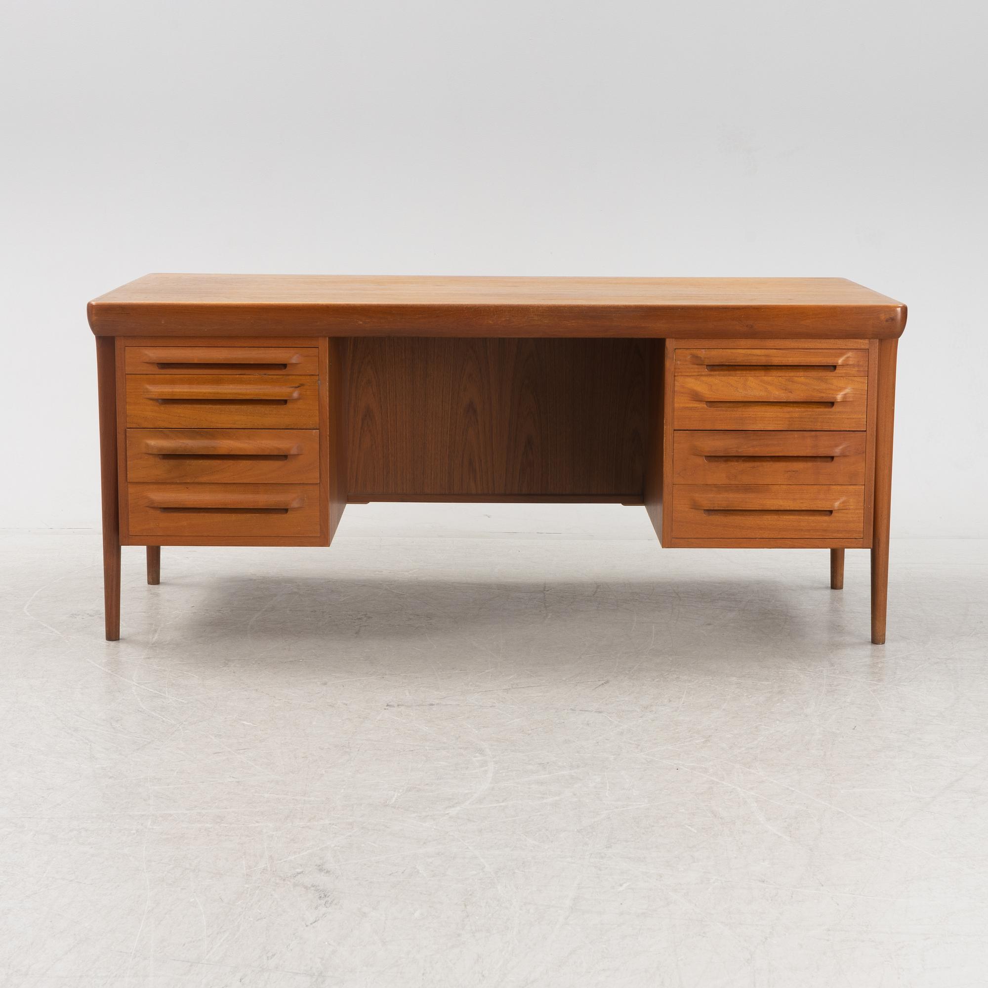 A teak 1950's/60's writing desk.