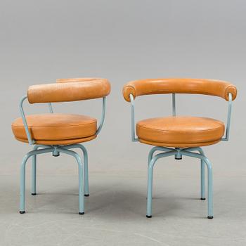 A set of four "LC7" chairs by Le Corbusier, Pierre Jeanneret and Charlotte Perriand for Cassina.