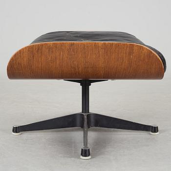 An easy chair and ottoman by Charles & Ray Eames, Herman Miller, USA, produced with licence by Hille, London.