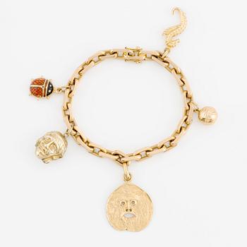 Bracelet 18K gold with charms.