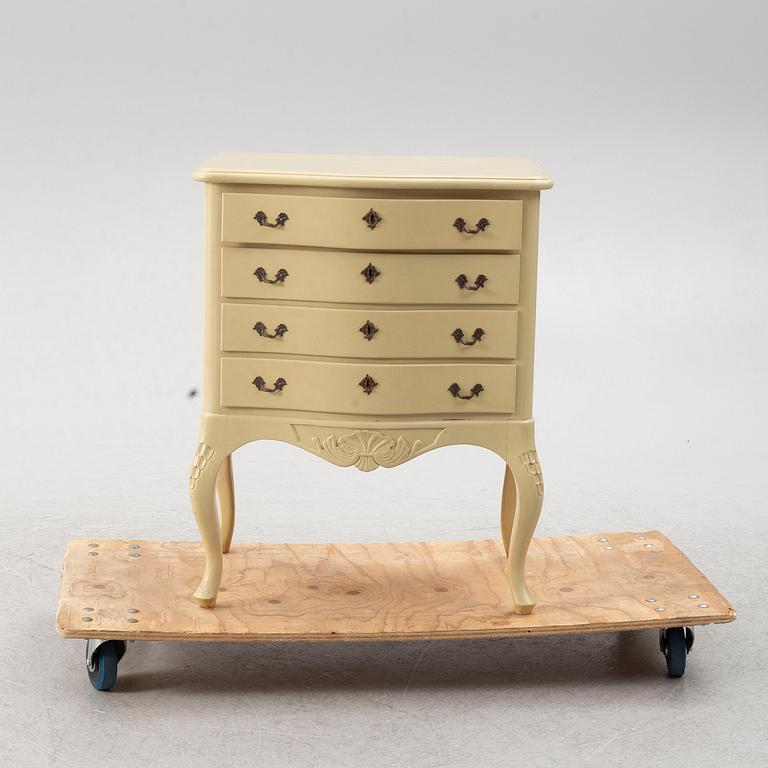 A Rococo style chest of drawers, mid-20th century.