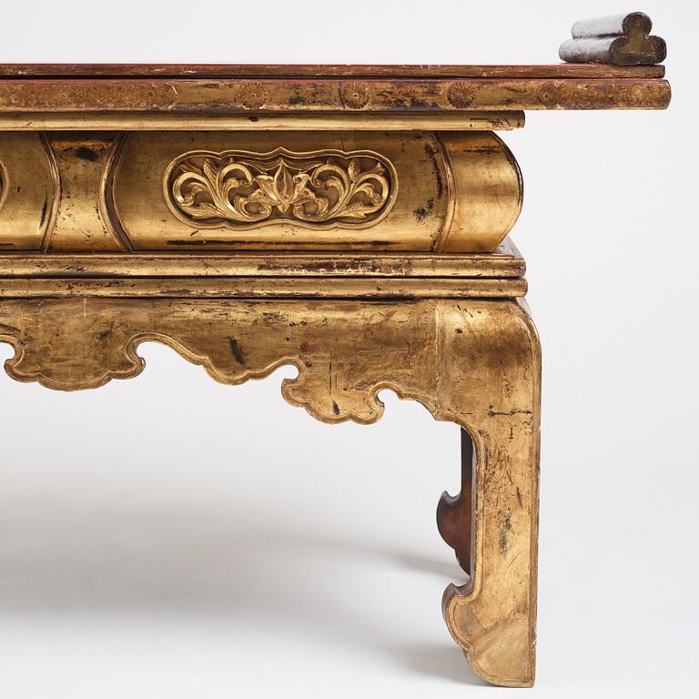 A Japanese lacquered and qilded Buddhist altar table or Butsudan.  Edo period (1603-1868).