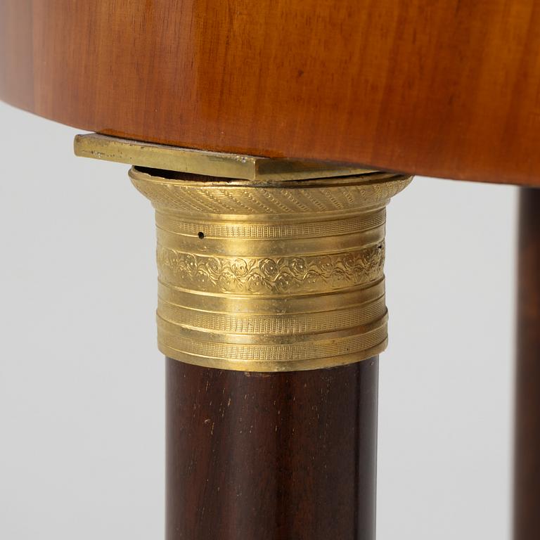 A Empire table, 19th Century.