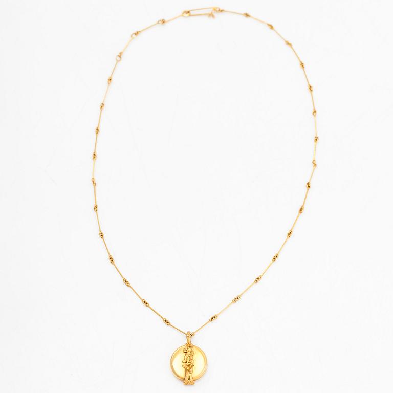 Björn Weckström, a 14K gold necklace with a pendant/ medallion, Lapponia 1976.