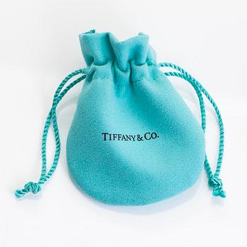 Tiffany & Co, Elsa Peretti, halsband, "Diamonds by the Yard", platina med en diamant ca 0.17 ct.