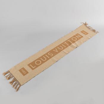 A cashmere scarf by Louis Vuitton.