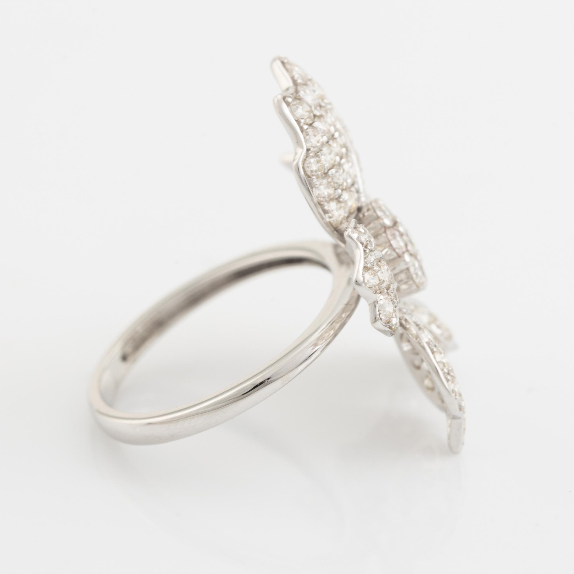 Brilliant cut diamond flower ring.
