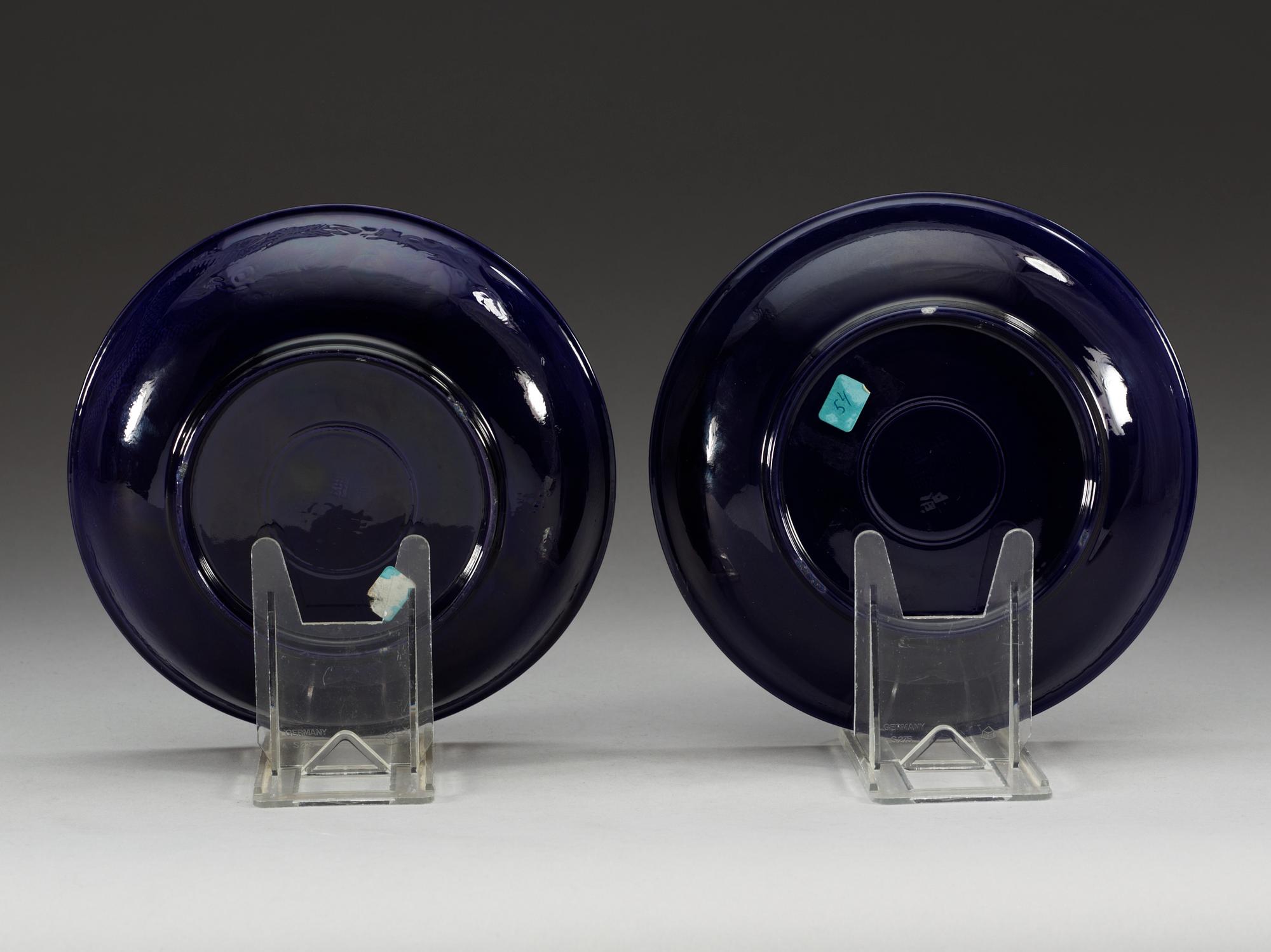 A pair of deep purple glazed dishes, Qing dynasty, with Qianlong six character mark.