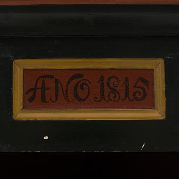 A corner cabinet from the first half of the 19th century.
