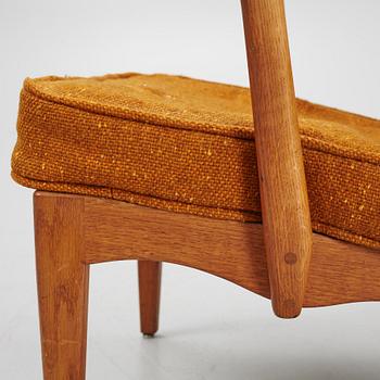 Carl Malmsten, a "Stora Fjäderbrickan" armchair, mid 20th century.