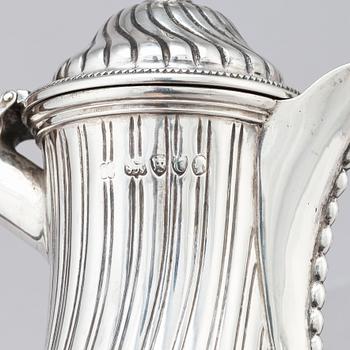 A Victorian silver coffee pot and a milk pot, Martin Hall & Co Ltd, London 1878 and Charles Stuart Harris, London 1877.