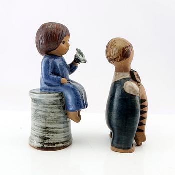 Lisa Larson, two figurines "Blomsterflicka" and "Pelle", Gustavsberg glazed stoneware.