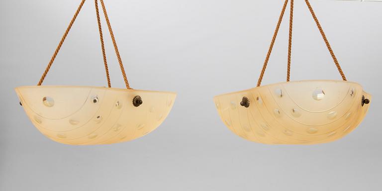 A pair of 1940s ceiling pendants.