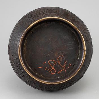 A bronze vase,  Japan, early 20th Century. After a Chinese archaic bronze model.