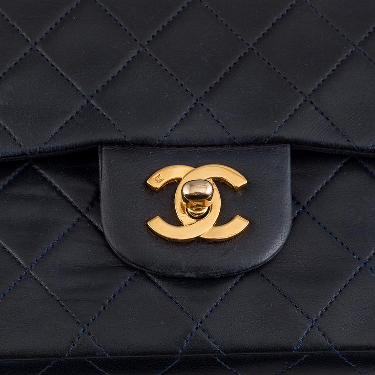 Chanel, a navy leather 'Double Flap Bag', 1989-91.