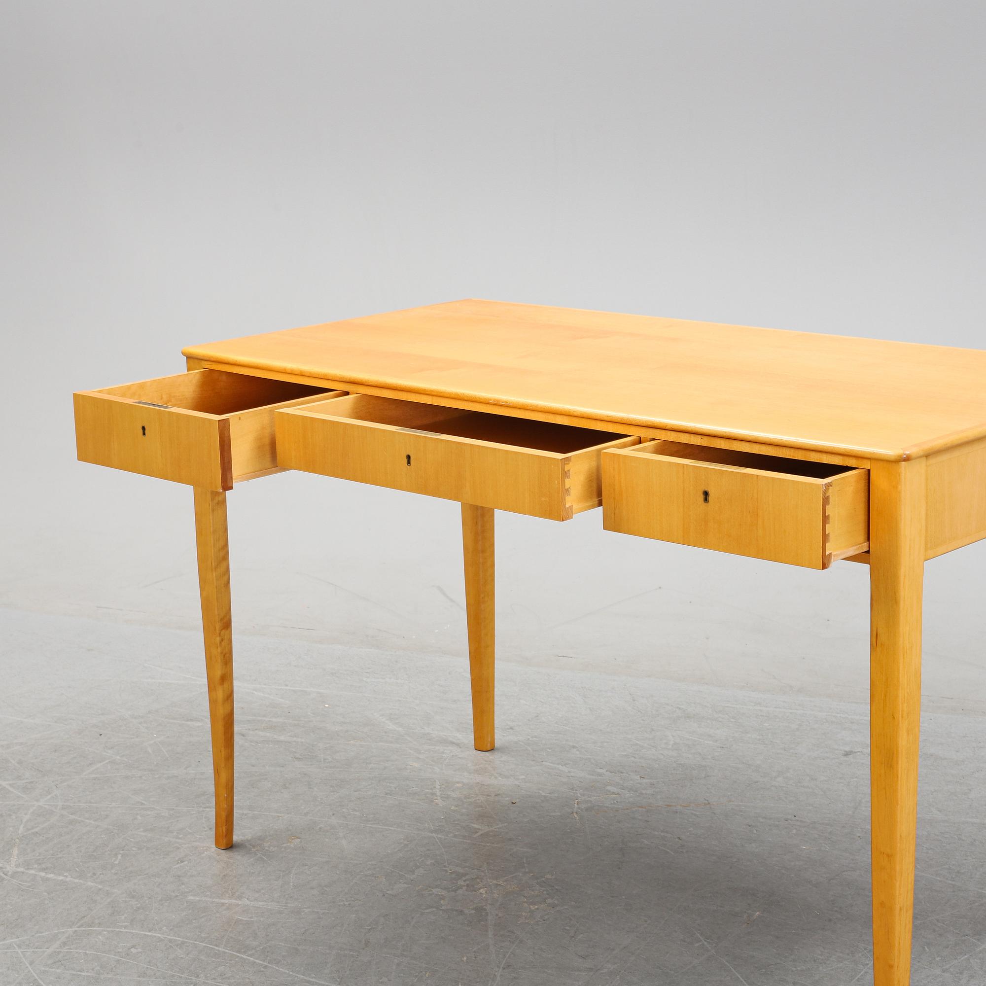 A 'Nya guldheden' desk by Carl Malmsten.