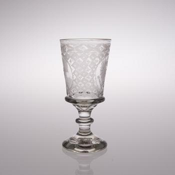 AN EARLY 19TH CENTURY RUSSIAN ENGRAVED GLASS GOBLET.