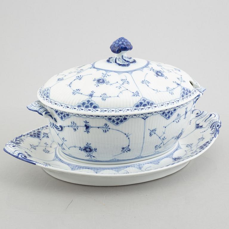 A 'Blue fluted half lace' / 'Musselmalet' porcelain tureen with cover and stand, Royal Copenhagen, model 595, 598, 1947.