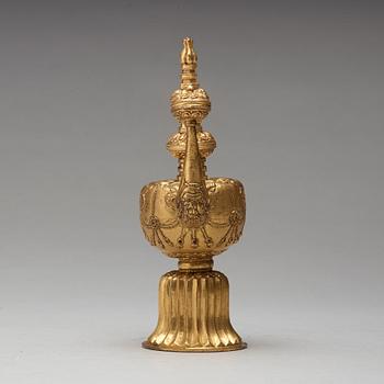 BUMPA, förgylld koppar. Tibet, 1800-tal.