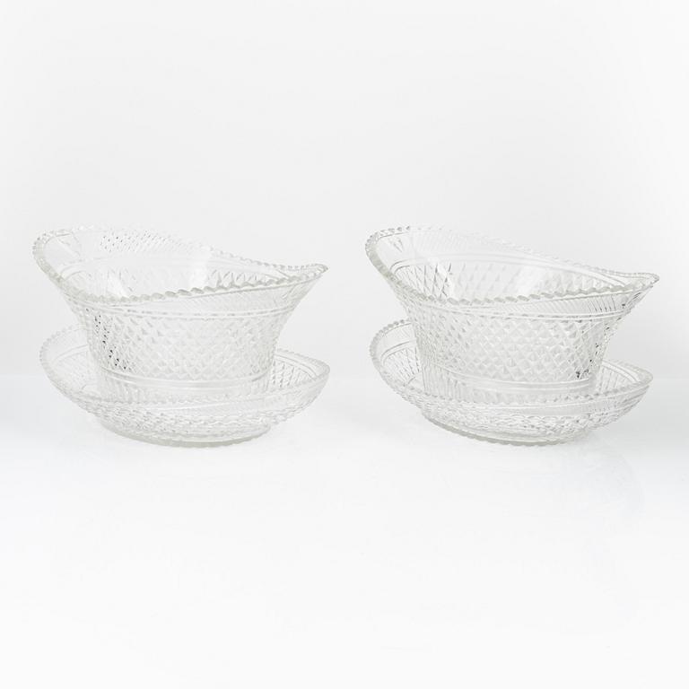 A pair of cut glas jardiieres on stands, 19th Century.