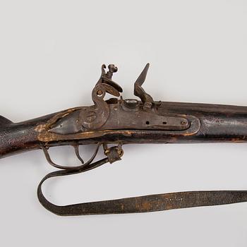 An early 19th century flintlock rifle.