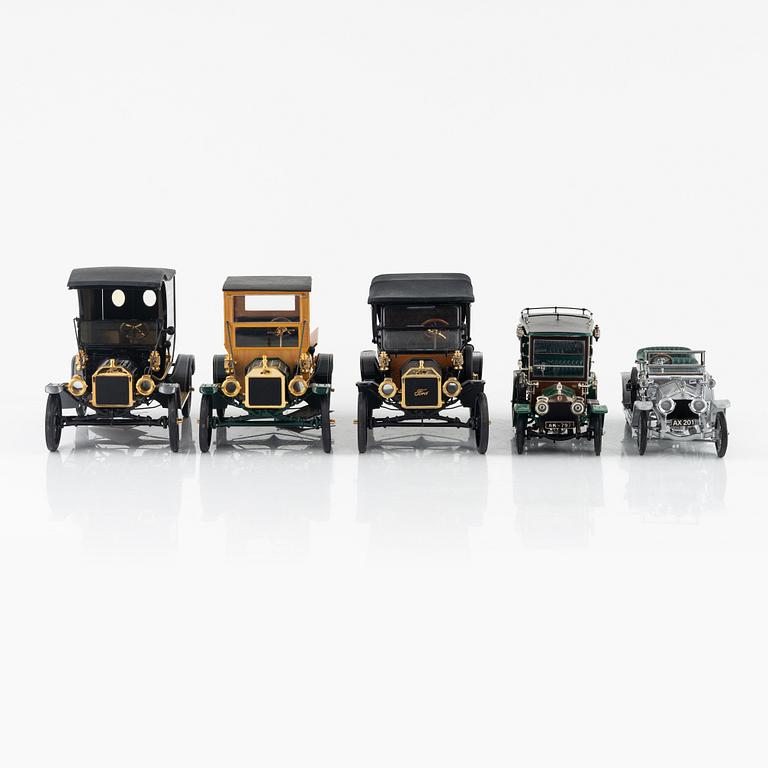 Eight Franklin Mint die cast car models.