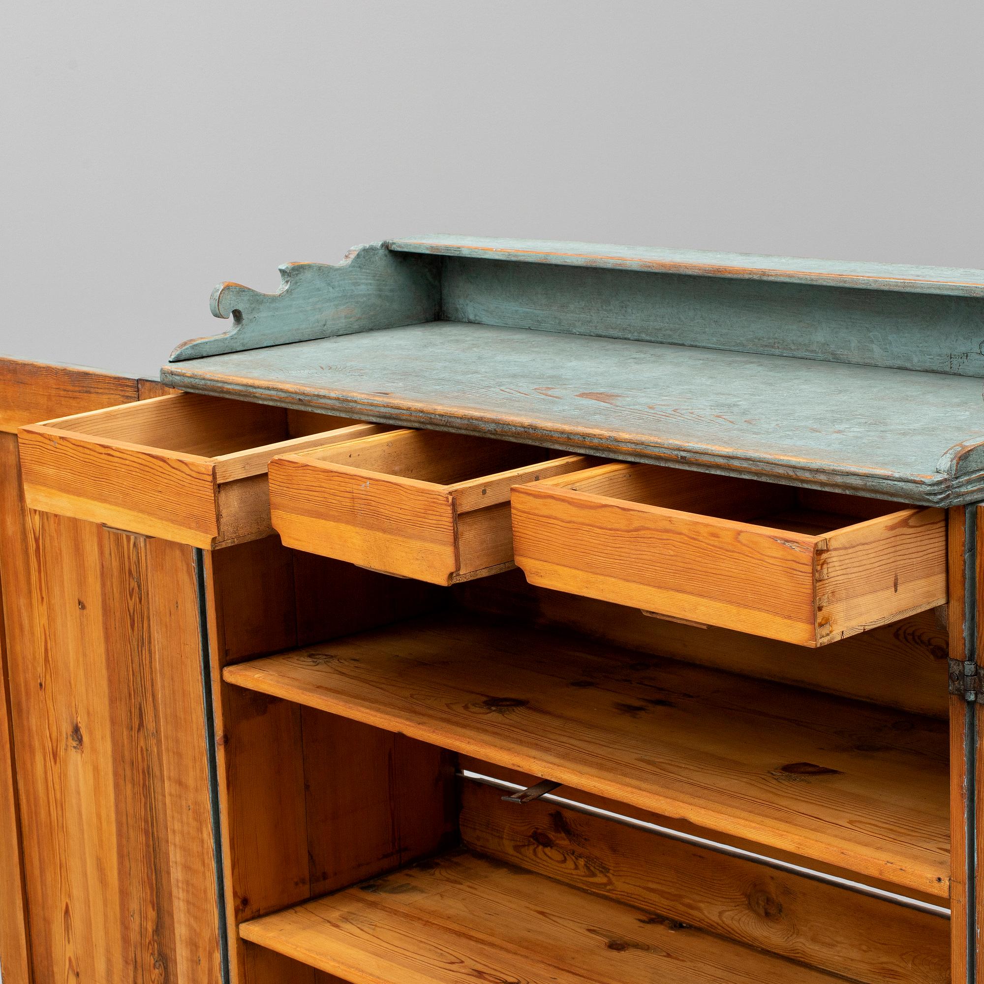 A first half of the 19th century painted cupboard.