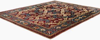 An Antique Agra carpet of 'Dragon Lattice' design, North India, 375 x 298 cm.