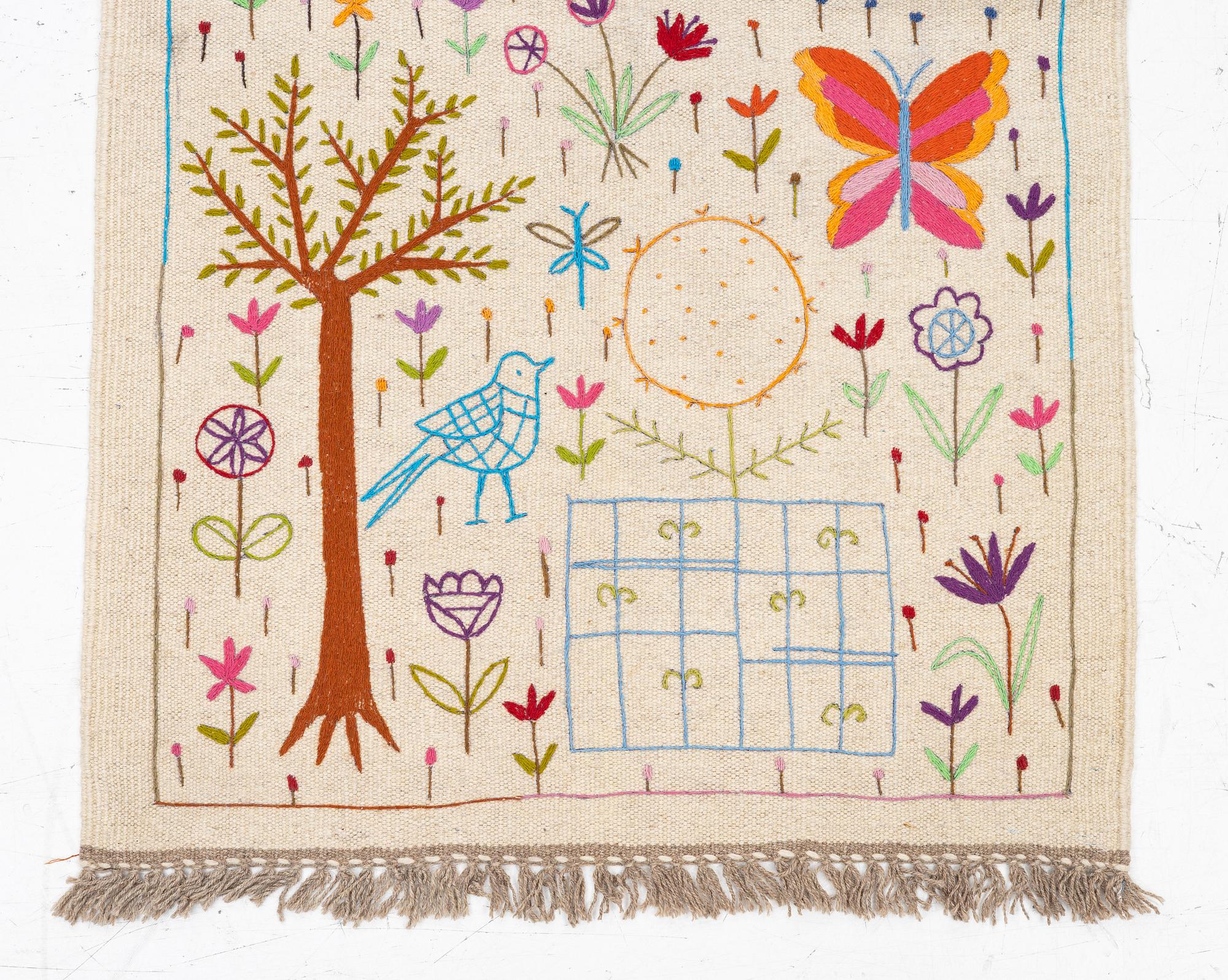 A hand-embroidered Kelim runner, c. 292 x 85 cm.