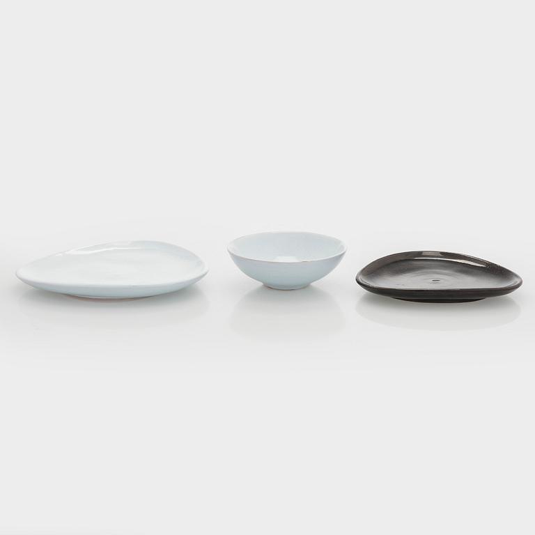 Marita Lybeck, two redclay plates and a dessert bowl, signed ML.
